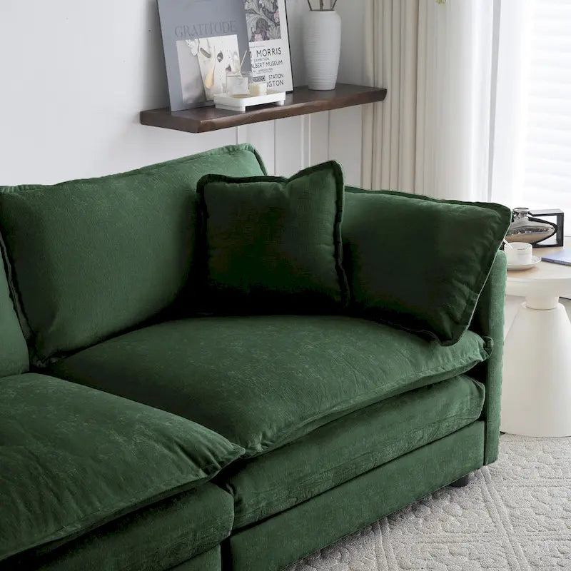 Fauteuil de lecture confortable et profond, une place, en tissu chenille vert, avec 1 coussin décoratif.
