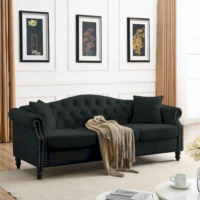 Canapé Chesterfield 3 places capitonné avec accoudoirs arrondis et clous décoratifs