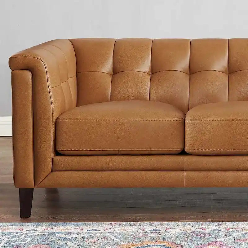 Canapé Hydeline Arvo en cuir pleine fleur avec garnissage en plumes, mousse à mémoire de forme et ressorts