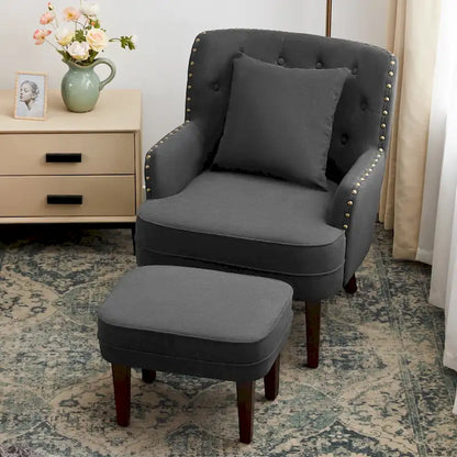 Fauteuil club capitonné avec repose-pieds et coussin