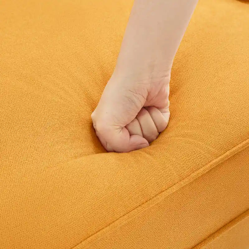 Fauteuil club capitonné avec repose-pieds et coussin