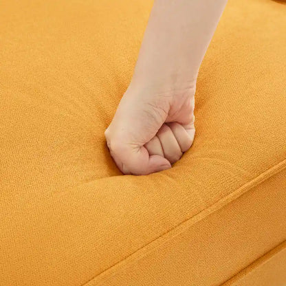 Fauteuil club capitonné avec repose-pieds et coussin