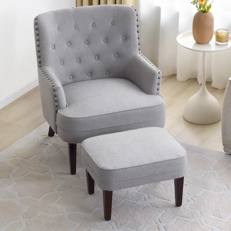 Fauteuil club capitonné avec repose-pieds et coussin