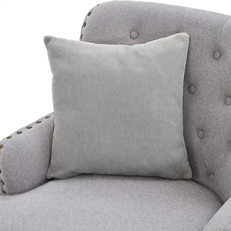 Fauteuil club capitonné avec repose-pieds et coussin