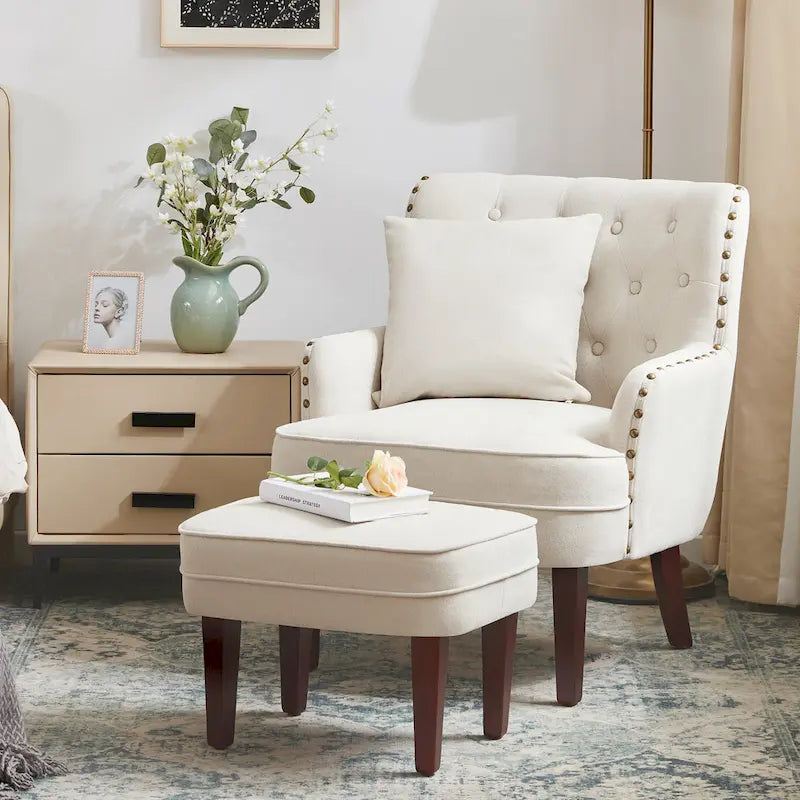 Fauteuil club capitonné avec repose-pieds et coussin