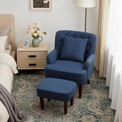 Fauteuil club capitonné avec repose-pieds et coussin