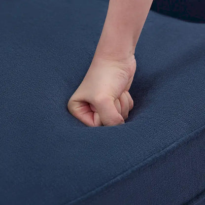 Fauteuil club capitonné avec repose-pieds et coussin