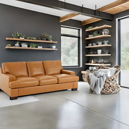 Canapé 3 places haut de gamme en cuir véritable, avec assise profonde et moelleuse et coussins en plumes d'oie pour un confort optimal.