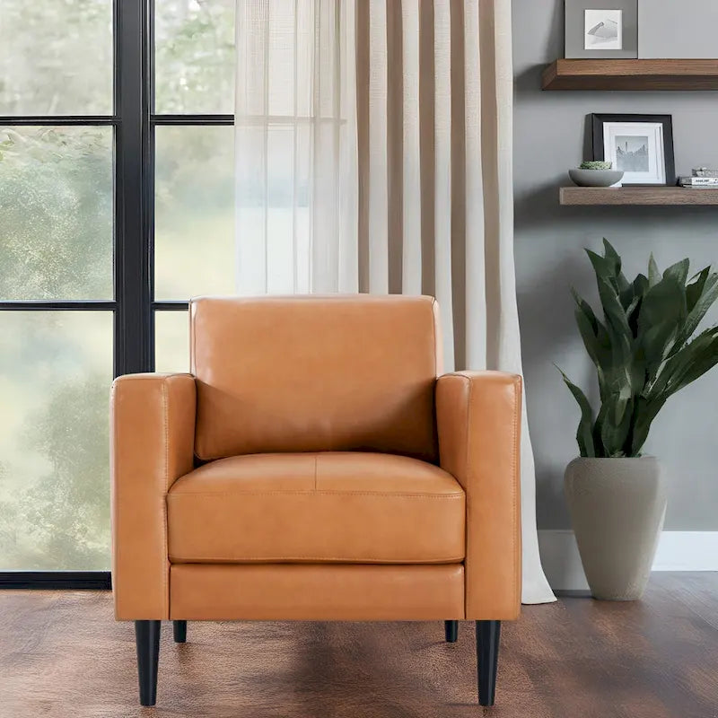 Fauteuil en cuir de vachette haut de gamme avec coussins haute densité et grand espace d'assise