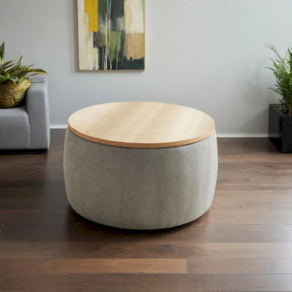 Pouf de rangement rond 3 en 1, servant à la fois de table basse et de table d'appoint artisanale.