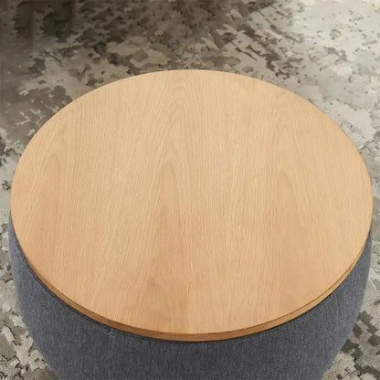 Pouf de rangement rond 3 en 1, servant à la fois de table basse et de table d'appoint artisanale.
