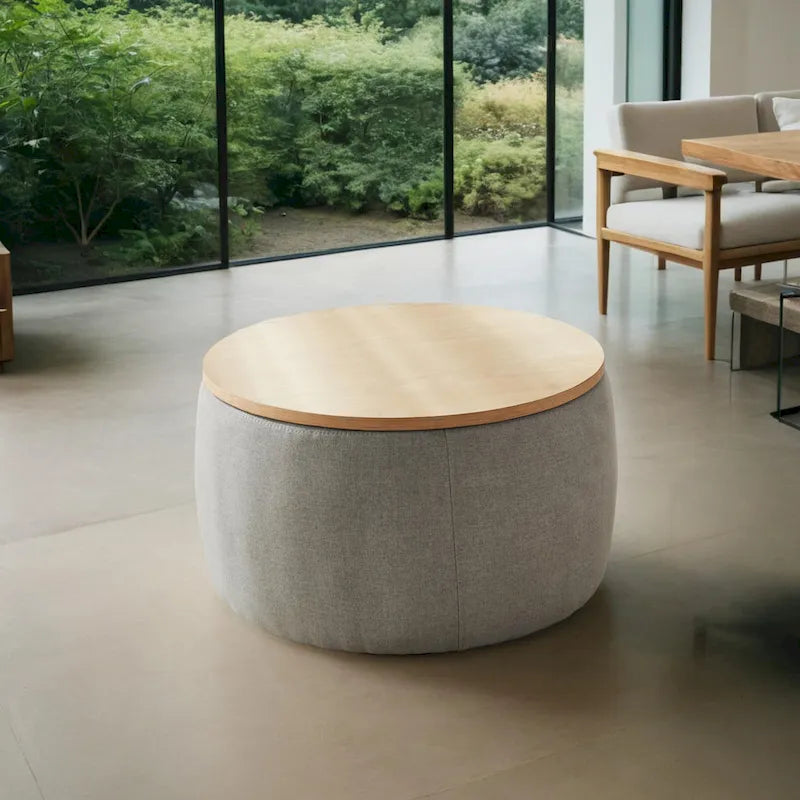 Pouf de rangement rond 3 en 1, servant à la fois de table basse et de table d'appoint artisanale.