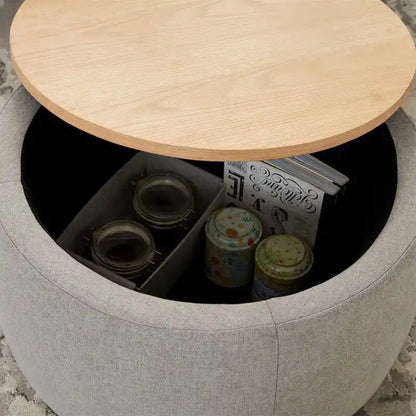 Pouf de rangement rond 3 en 1, servant à la fois de table basse et de table d'appoint artisanale.