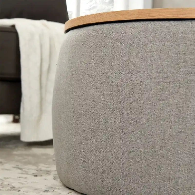 Pouf de rangement rond 3 en 1, servant à la fois de table basse et de table d'appoint artisanale.