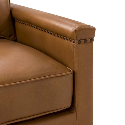 Fauteuil pivotant classique Rita en cuir véritable avec garnitures cloutées par HULALA HOME