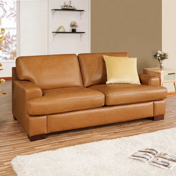 Canapé deux places en cuir véritable, accoudoirs carrés, pieds massifs robustes - Coussin luxueux en plumes d'oie pour un confort optimal
