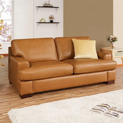 Canapé deux places en cuir véritable, accoudoirs carrés, pieds massifs robustes - Coussin luxueux en plumes d'oie pour un confort optimal