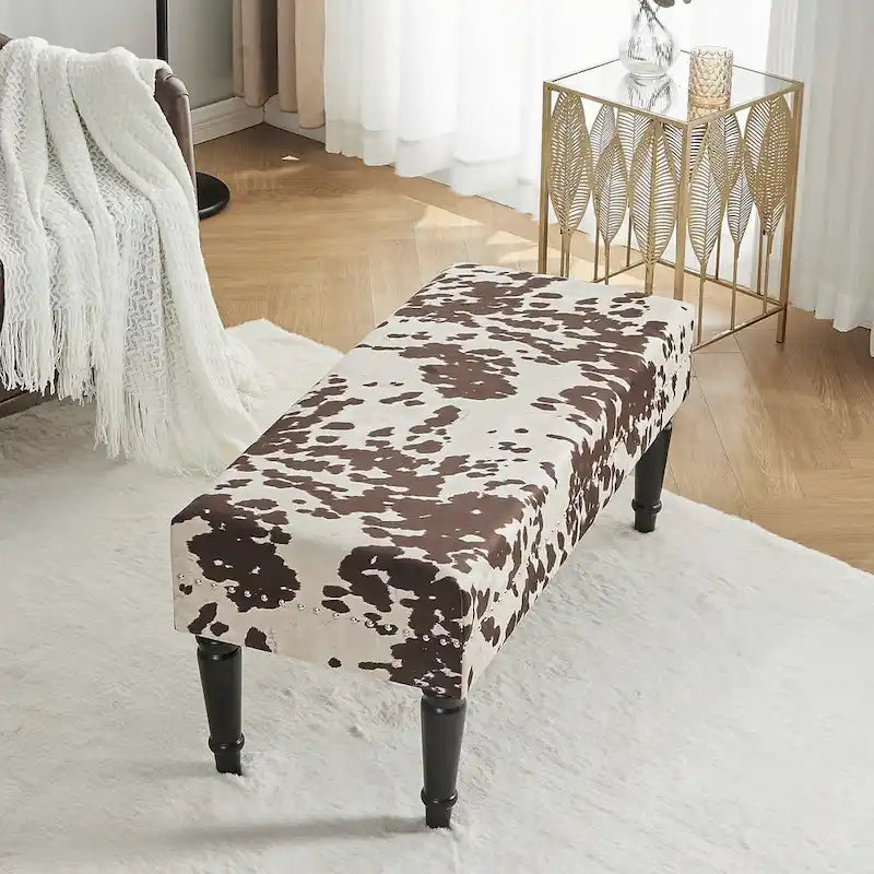 Tabouret ottoman en tissu vache Adeco
