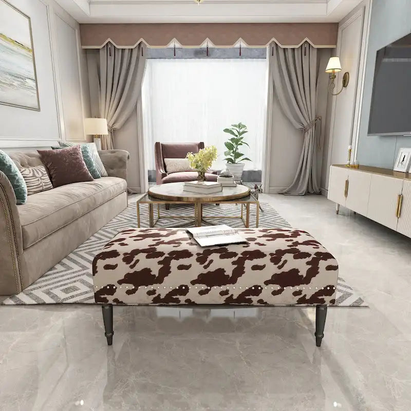 Tabouret ottoman en tissu vache Adeco