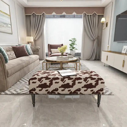 Tabouret ottoman en tissu vache Adeco