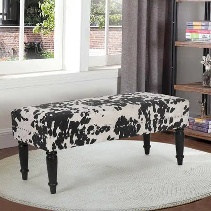 Tabouret ottoman en tissu vache Adeco