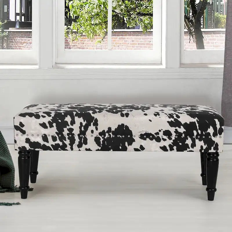 Tabouret ottoman en tissu vache Adeco