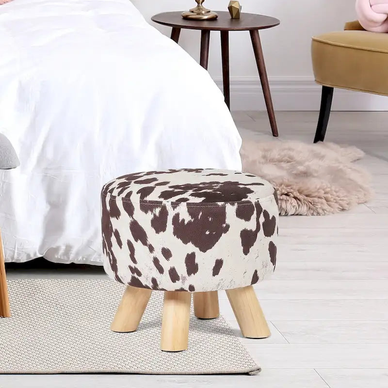 Tabouret ottoman en tissu vache Adeco