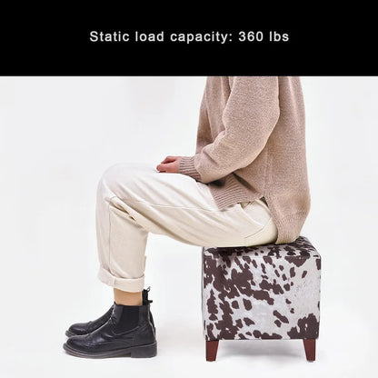 Tabouret ottoman en tissu vache Adeco