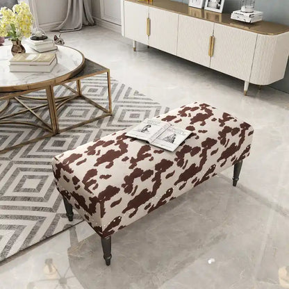 Tabouret ottoman en tissu vache Adeco