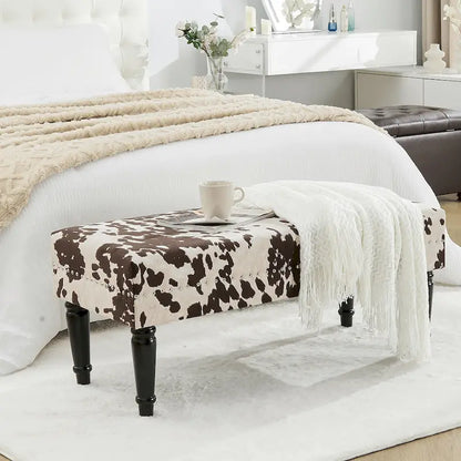 Tabouret ottoman en tissu vache Adeco