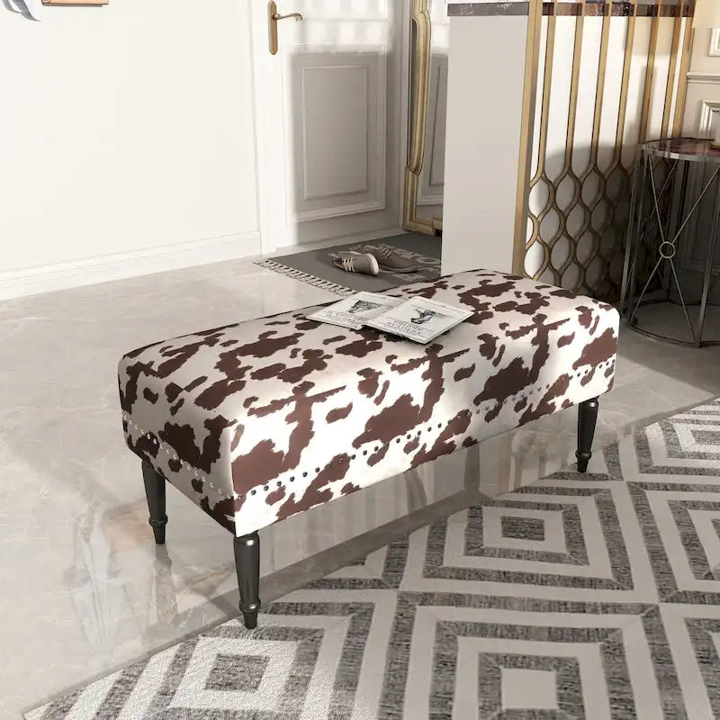 Tabouret ottoman en tissu vache Adeco