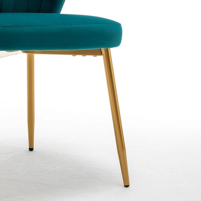 Fauteuil d'appoint moderne en velours avec capitonnage à canaux, confortable et tendance, sans accoudoirs.