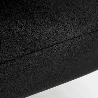 Fauteuil d'appoint moderne en velours avec capitonnage à canaux, confortable et tendance, sans accoudoirs.