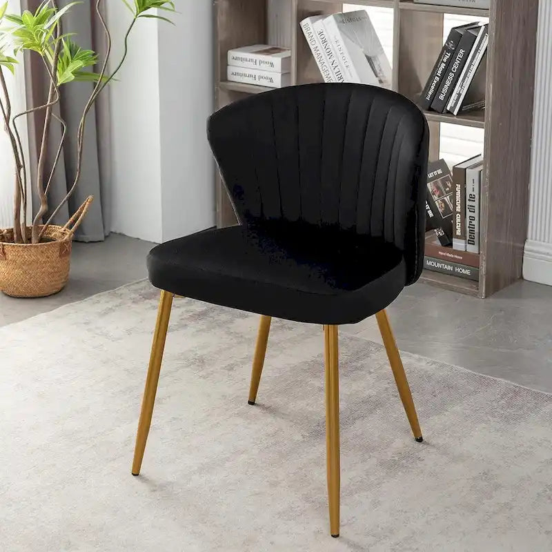 Fauteuil d'appoint moderne en velours avec capitonnage à canaux, confortable et tendance, sans accoudoirs.