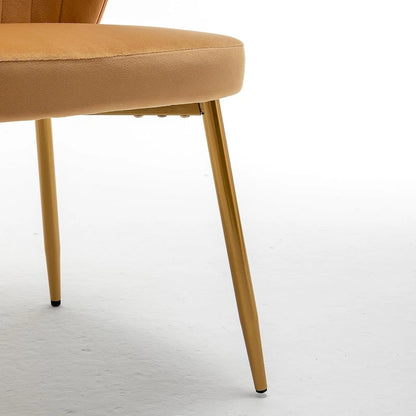 Fauteuil d'appoint moderne en velours avec capitonnage à canaux, confortable et tendance, sans accoudoirs.