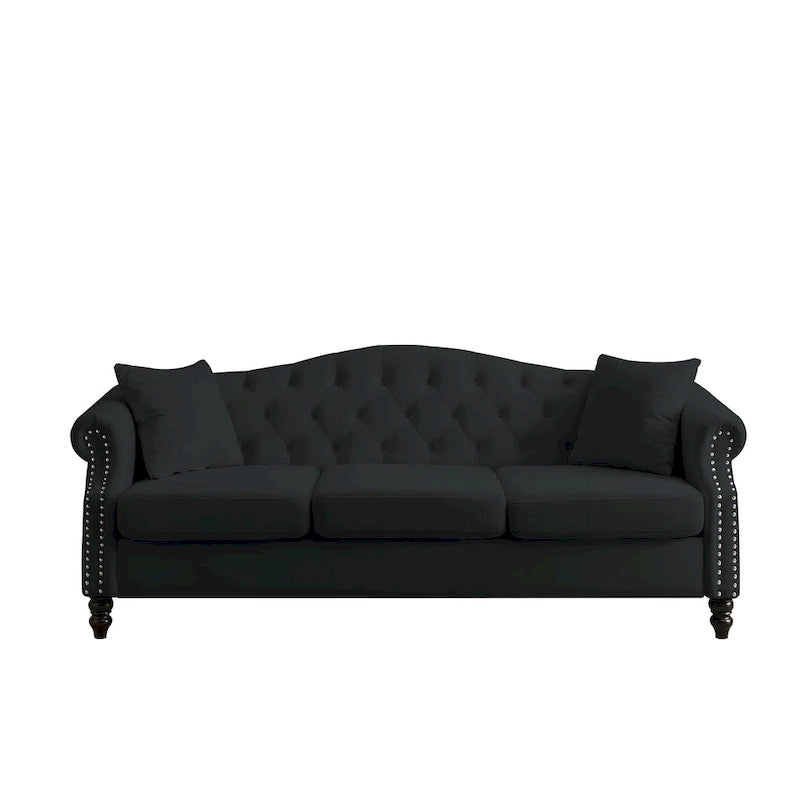 Canapé Chesterfield 3 places capitonné avec accoudoirs arrondis et clous décoratifs