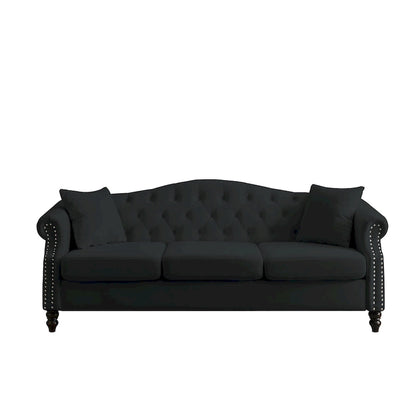 Canapé Chesterfield 3 places capitonné avec accoudoirs arrondis et clous décoratifs