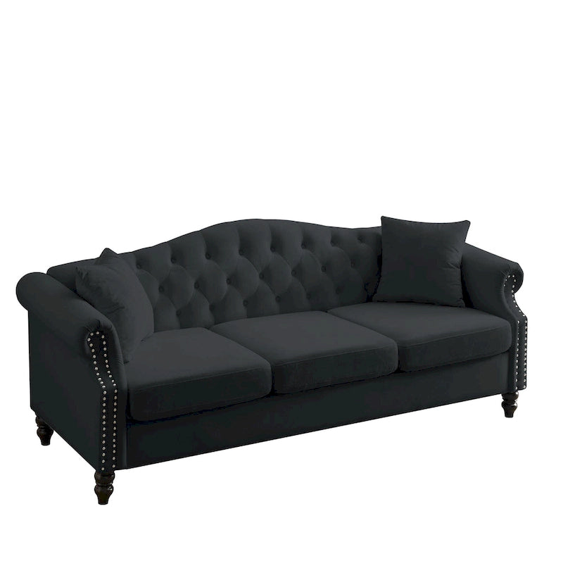 Canapé Chesterfield 3 places capitonné avec accoudoirs arrondis et clous décoratifs