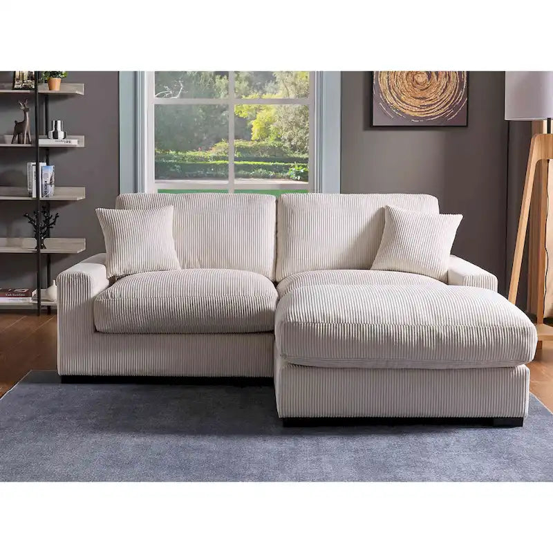 Canapé d'angle profond en velours côtelé avec pouf et coussins