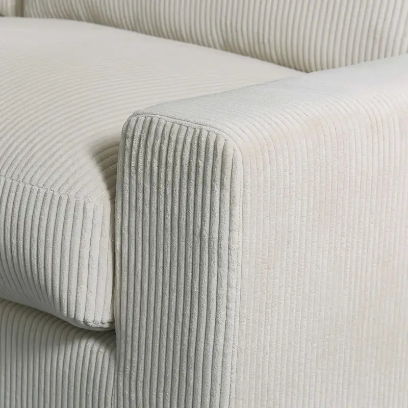 Canapé d'angle profond en velours côtelé avec pouf et coussins