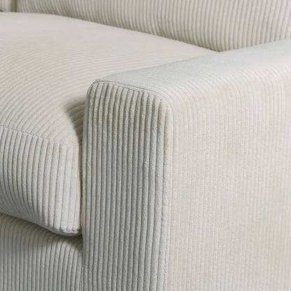 Canapé d'angle profond en velours côtelé avec pouf et coussins