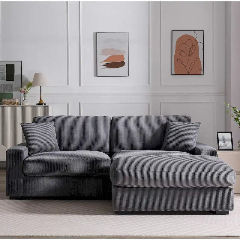 Canapé d'angle profond en velours côtelé avec pouf et coussins