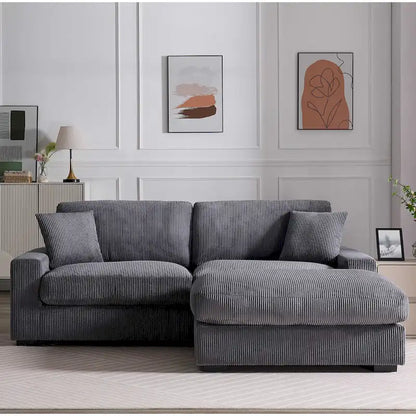 Canapé d'angle profond en velours côtelé avec pouf et coussins