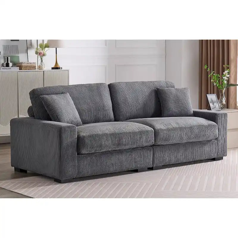 Canapé d'angle profond en velours côtelé avec pouf et coussins