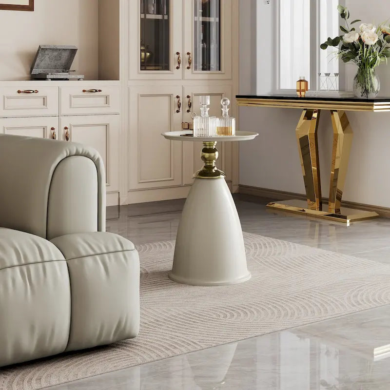 Table d'appoint ronde minimaliste en fer forgé au design luxueux, idéale pour les petits espaces.