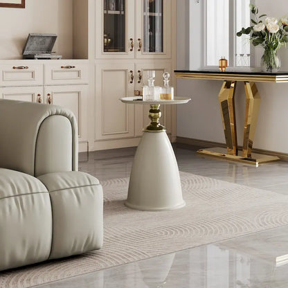 Table d'appoint ronde minimaliste en fer forgé au design luxueux, idéale pour les petits espaces.