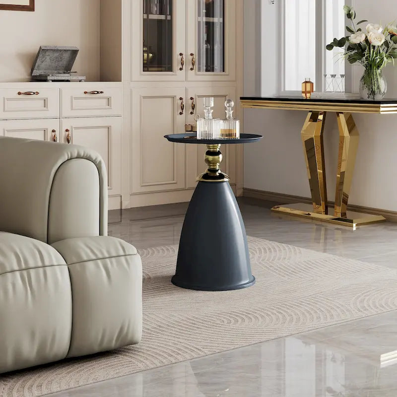 Table d'appoint ronde minimaliste en fer forgé au design luxueux, idéale pour les petits espaces.